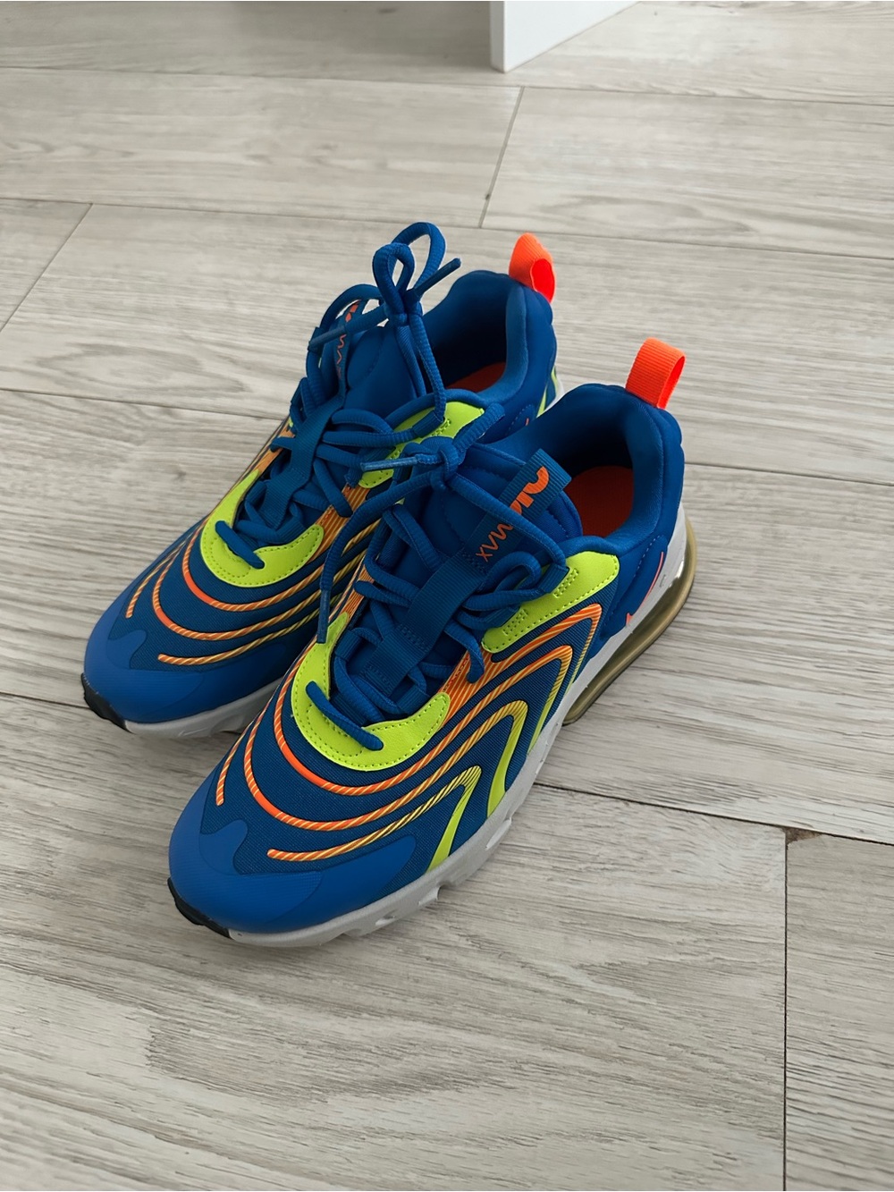 Nike Kids Blue Sneakers with Neon Green and Orange Accents
